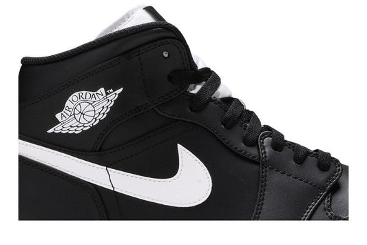 Jordan 1 Retro Mid Black White
