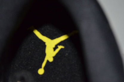 Jordan 11 Retro Low IE Black Zest